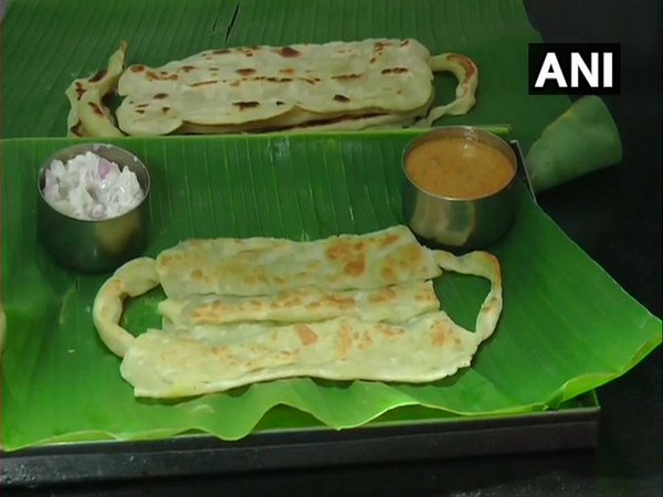 A restaurant in Madurai is serving parottas made in the shape of masks. [Photo/ANI]