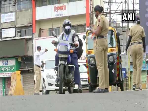 Police in Pune checked vehicles amid the first phase of the 10-day COVID lockdown. [Photo/ANI]