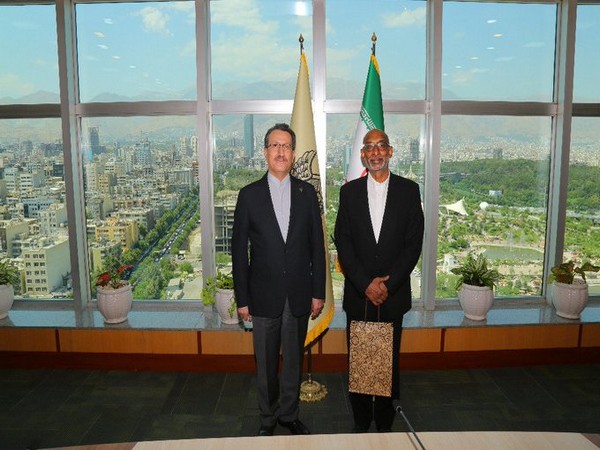 Indian Ambassador Gaddam Dharmendra (R) with Saeed Rasouli, Deputy Minister Roads and Head of Iran Railways (L)