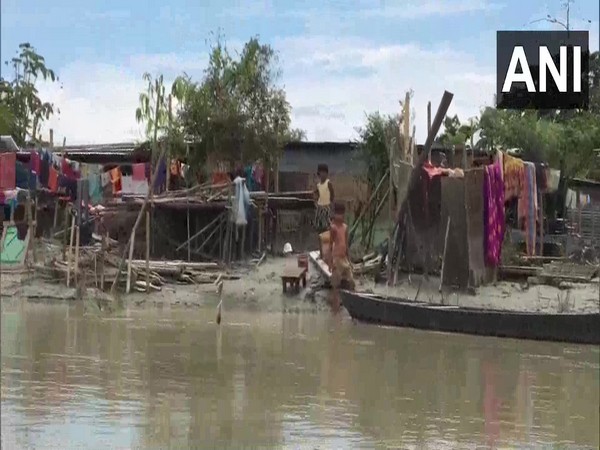 Flood victims take shelter in temporary relief camps.  