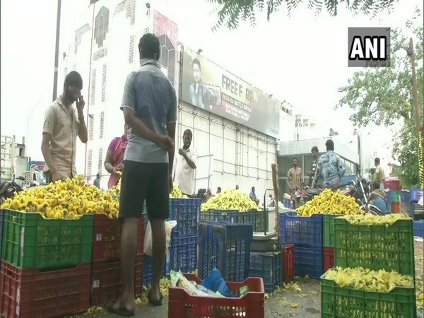 Temporary flower market in front of Rohini theater in Chennai's Koyambedu