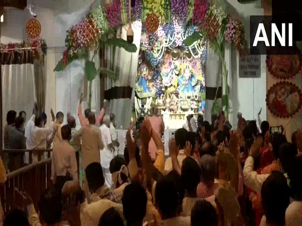 Devotees offered prayers at ISKCON temple in New Delhi on the occasion of Krishna Janmashtami. (Photo/ANI)