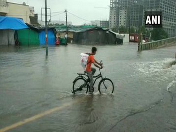 Water logging reported in several parts of Surat city after heavy rainfall in the area (Photo/ANI)