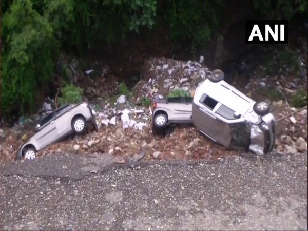 3 cars damaged in jammu after a road caved-in near Circular Road area (Photo/ANI)