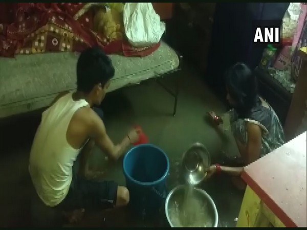 Rainwater entered the residential areas of Jabalpur on Sunday night, following heavy rainfall in the region (Photo/ANI)