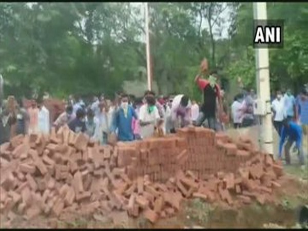 Boundary wall being constructed by Visva-Bharati University in Pous Mela ground vandalised in Birbhum (Photo/ANI)