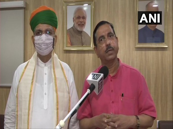 Union Minister of Coal and Mines Pralhad Joshi (In Red) talking to ANI (Photo/ANI)