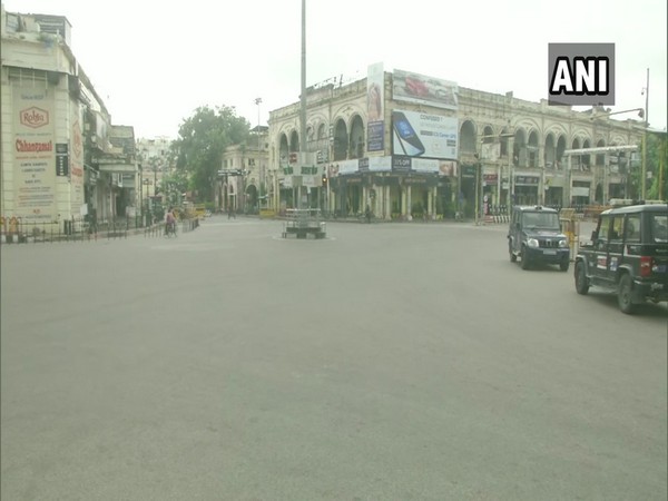 The streets of Hazratganj area in Lucknow wore a deserted look amid the weekly lockdown. (Photo/ANI)