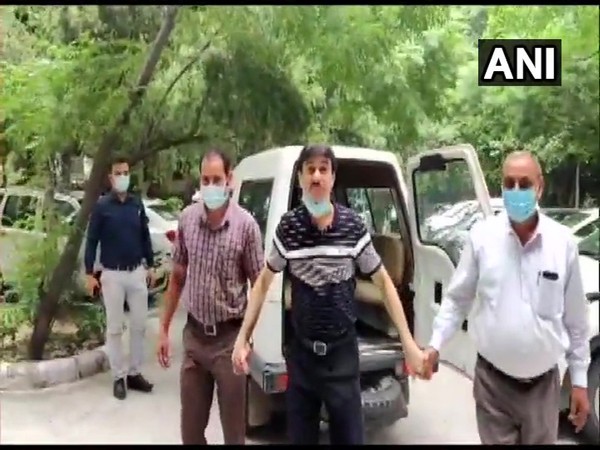 A visual of Delhi Police's EOW team bringing Piyush Bandopadhyay to its office on Thursday. Photo/ANI