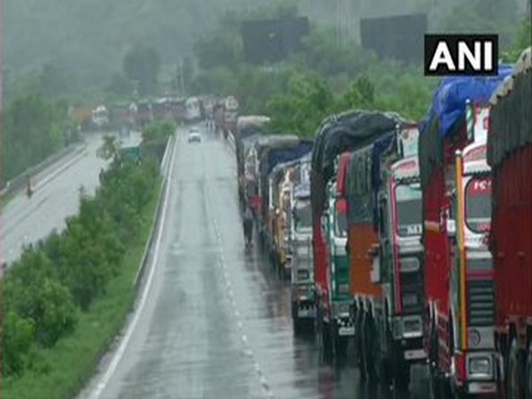 Many trucks stuck on Jammu Srinagar National Highway in Jammu following its closure due to landslides (Photo/ANI)