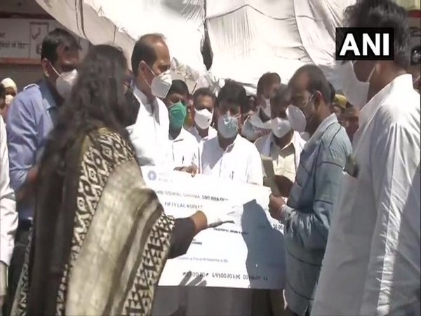 Uttar Pradesh Suresh Rana gives Rs 50 lakh to the kin of Late Sepoy Prashant Sharma [Photo/ANI]