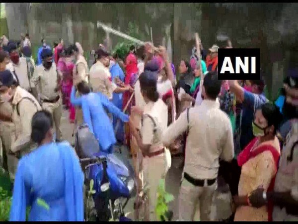 Police baton-charged locals protesting the cremation of a COVID-19 patient's body. (Photo/ANI)