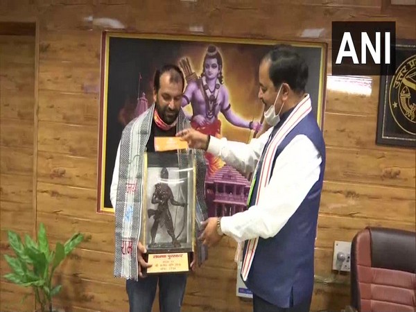 Deputy CM KP Maurya gives financial aid of Rs 51,000 to Shanish Mani Mishra, a soft tennis player and recipient of Laxman award. 