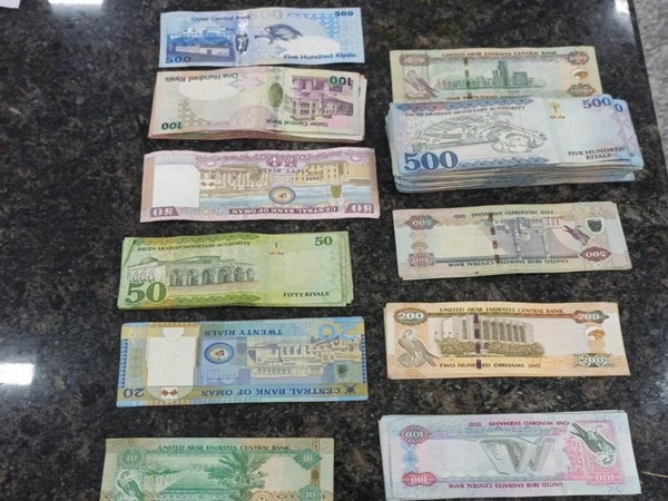 Foreign currency worth Rs 15.7 lakh seized from passenger at Kozhikode airport on Sunday. (Photo/ANI)