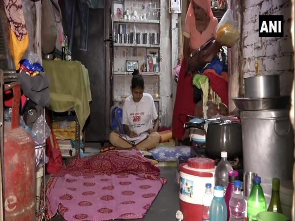 Gunjan, a student of Class 10 in a government school, at her home in Delhi. (Photo/ANI)