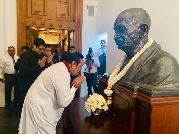 Sri Lankan Prime Minister Mahinda Rajapaksa paying tribute to Mahatma Gandhi on Friday. (Photo credit: India in Sri Lanka Twitter)