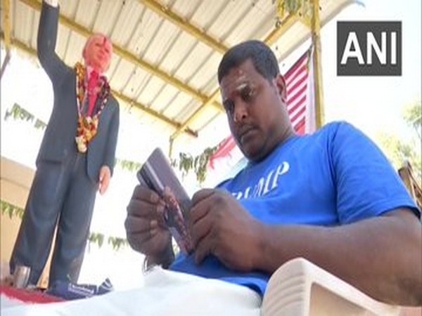 Bussa Krishna Raju near President Donald Trump's statue at his home in Medak. (File Photo/ANI)