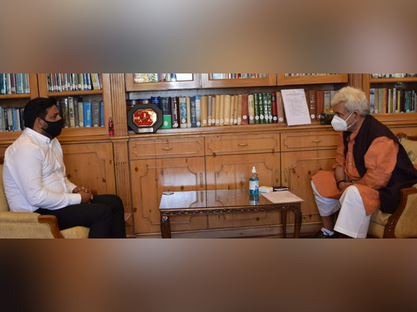 Rajya Sabha MP Mir Mohammed Fayaz with Lieutenant Governor Manoj Sinha on Tuesday. (Photo Credits: DIPR-J&K Twitter) 