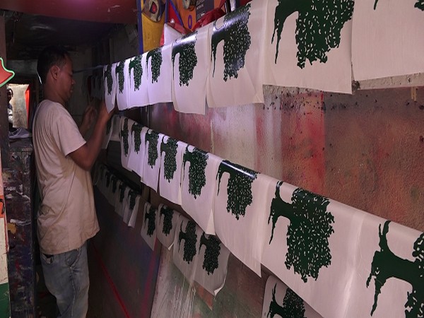 Election mood in Nepal: Flags fly off the shelves
