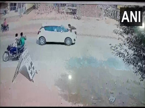 A constable was dragged on the bonnet by a car driver in Aligarh.