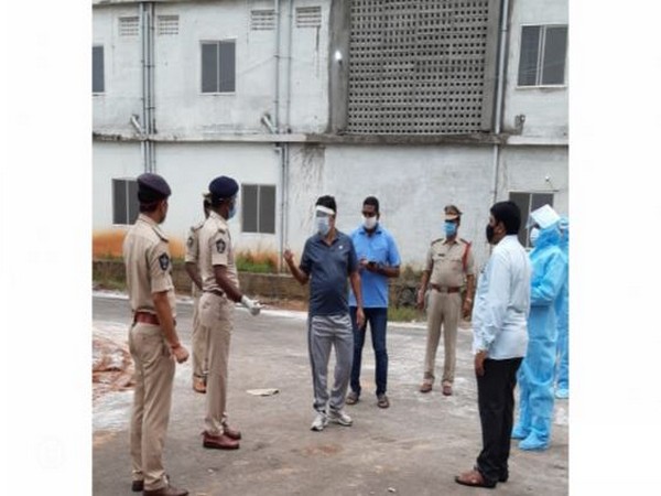 Police gathered around the COVID care centre in Eluru city, Andhra Pradesh. (Photo/ANI) 
