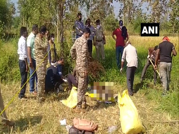 Forest officials gathered around tiger carcass. (Photo/ANI)