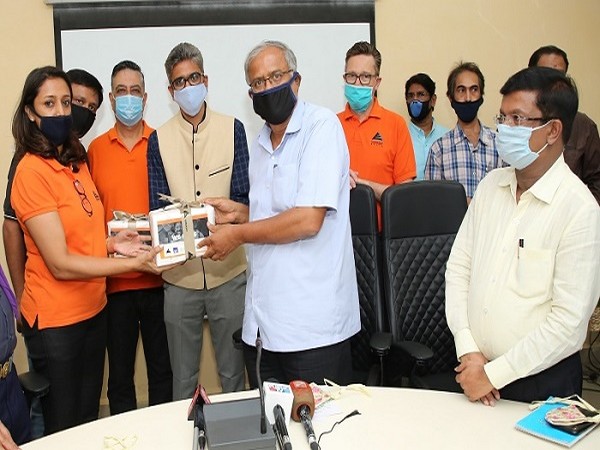 Embassy Office Parks hands over sanitizers to the Education Minister S Suresh Kumar