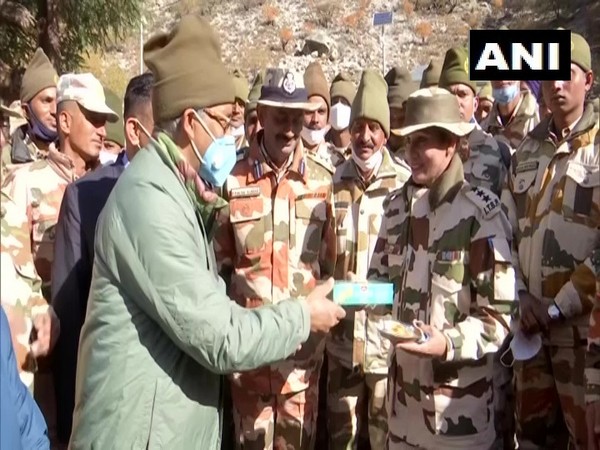 Uttarakhand CM Trivendra Singh Rawat celebrated Deepavali with Jawans of ITBP, Indian Army in Uttarkashi district. [Photo/ANI]