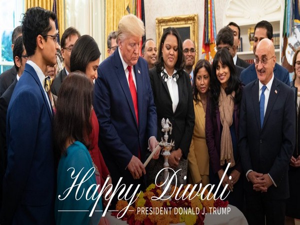 US President Donald Trump lights a lamp on Diwali on Saturday. (Twitter/Donald Trump)
