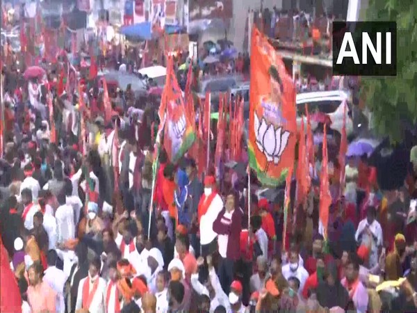 Crowds gather in Hyderabad at BJP cheif JP Nadda's roadshow. (Photo/ANI)