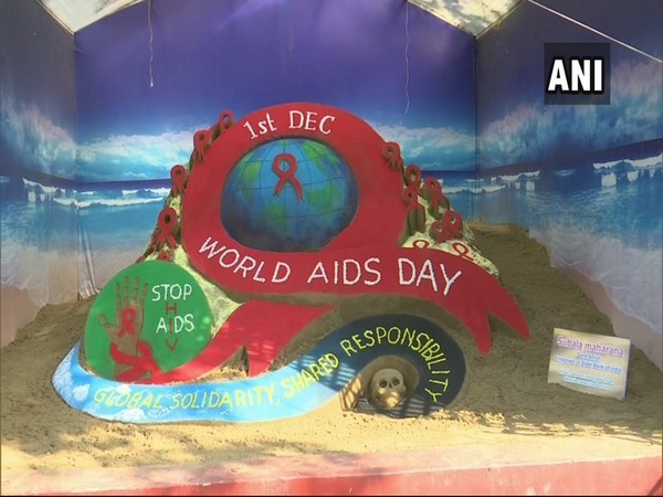 The sand sculpture created by Subal Moharana to spread awareness about World AIDS day. (Photo/ANI)