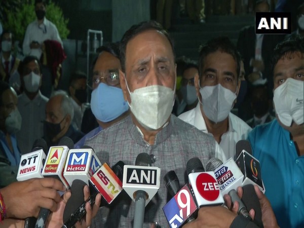 Gujarat Chief Minister Vijay Rupani speaking to reporters in Rajkot on Sunday [Photo/ANI]
