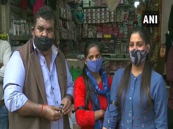 In Delhi's Sarojini Nagar market, shopkeepers tied black ribbons around their arms to extend solidarity with farmers.