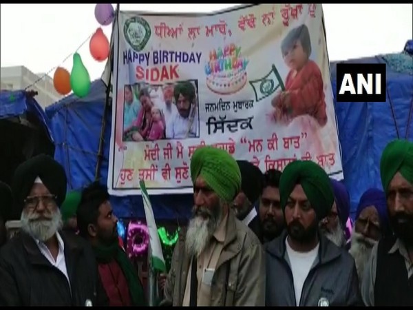 Farmers at the Tikri border celebrate their fellow protestor daughter's first birthday. (Photo/ANI)