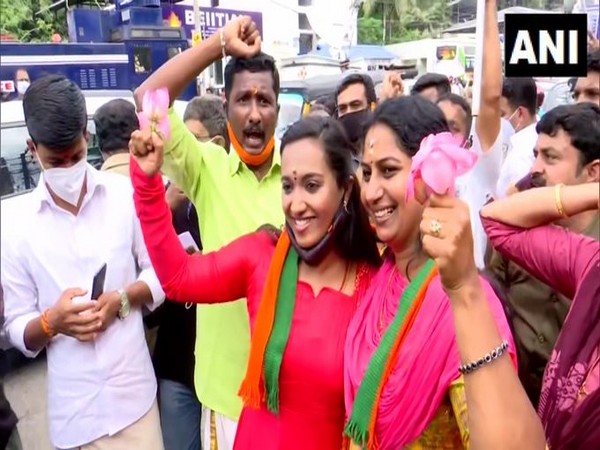 BJP workers celebrate in Thiruvananthapuram. (Photo/ANI)