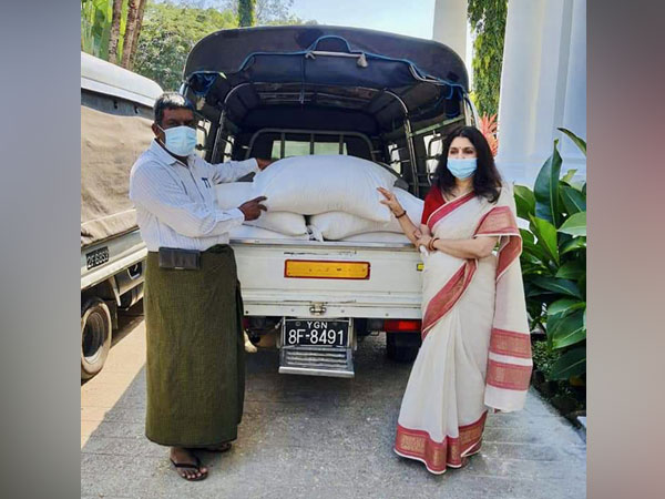 Indian Women's Association of Yangon (IWAY) President Smriti Srivastav donating food rations in Myanmar (Source: India in Myanmar/Twitter)
