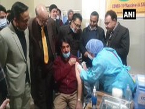 Health workers were given COVID-19 vaccine shots in Doda district, Jammu and Kashmir on Saturday (Photo/ANI)