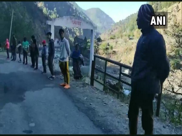 A 19 km long human chain was formed to demand widening of road in Uttarakhand [Photo/ANI]