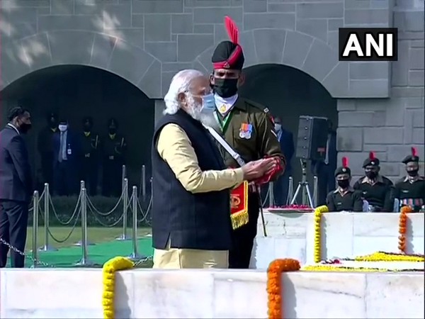 Prime Minister Narendra Modi pays tribute to Mahatma Gandhi at Raj Ghat (Photo/ANI)