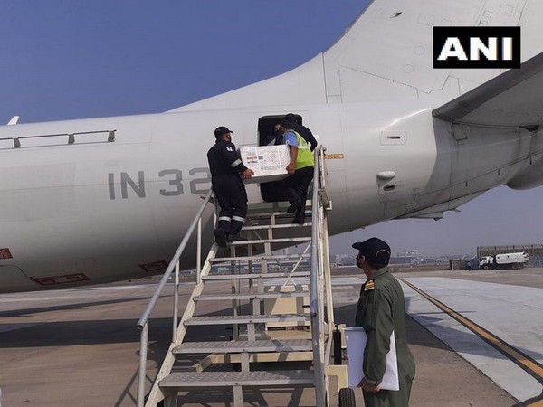 Indian Navy P-8I maritime reconnaissance aircraft loading #COVID19 vaccines that will be supplied to Mauritius and Seychelles (Photo/ANI)