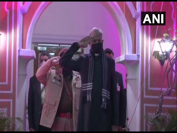 Ashok Gehlot hoisting the tricolour at his residence in Jaipur.