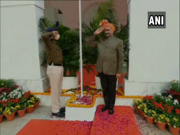 Om Birla after hoisting the national flag at his residence