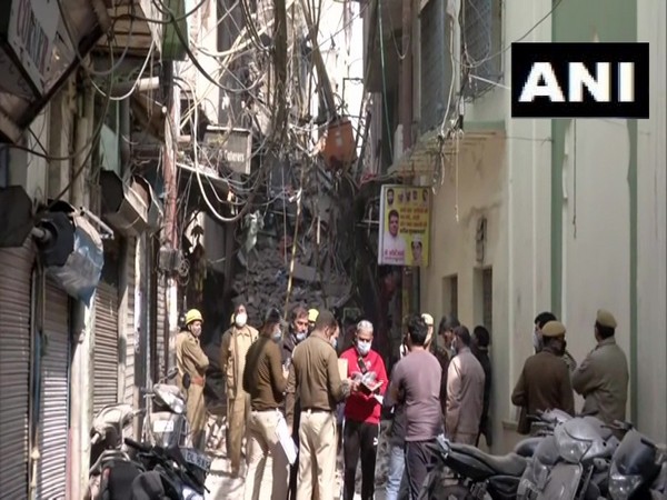 Police personnel at the site where building collapsed in Delhi. (Photo/ANI)  