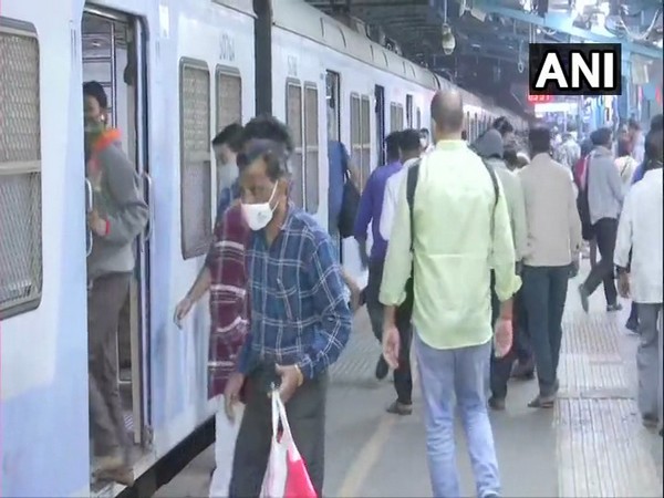 Passengers arrive at Dadar railway station in Mumbai (Photo/ANI)