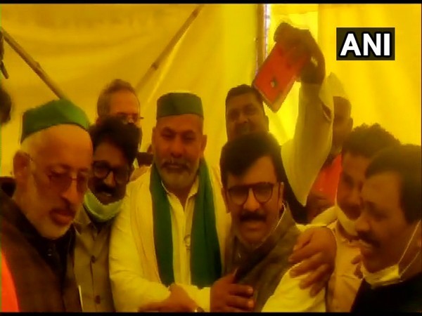 Shiv Sena leaders Arvind Sawant and Sanjay Raut met Bharatiya Kisan Union leader Rakesh Tikait at Ghazipur border on Tuesday. [Photo/ANI]
