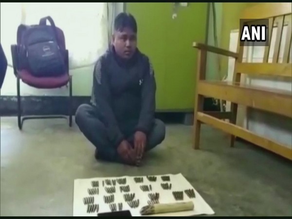 Man held with elephant tusk, 105 live bullets in Assam (Photo/ANI)
