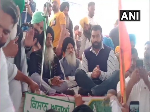 Accused Lakhbir Singh, alias Lakha Sidhana (in white shirt, dark sweater) spotted at a rally in Bathinda. (Photo/ANI)