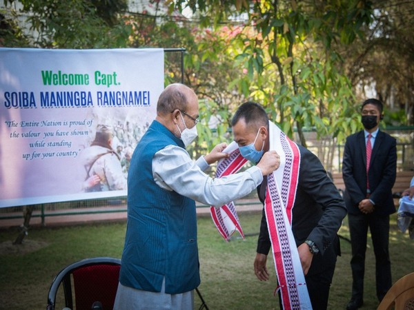 Manipur Chief Minister N. Biren Singh felicitates Captain Soiba Maningba Rangnamei of 16 Bihar Regiment in Imphal on Tuesday.