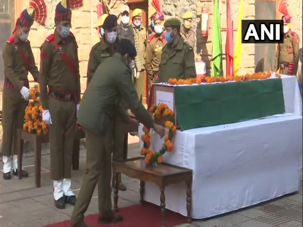 Wreath laying ceremony of SPO Mohammad Altaf being held in Srinagar. (Photo/ANI)