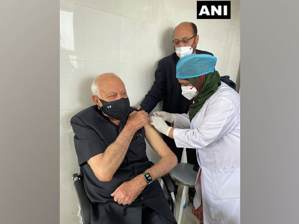 National Conference MP Farooq Abdullah receiving first dose of COVID-19 vaccine (Photo/ANI)